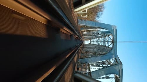 Vertical Video Fast Flight Over the Railway Bridge on FPV Drone