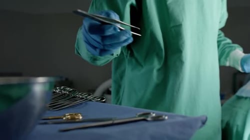 Surgeons Performing Operation in a Hospital Operating Room