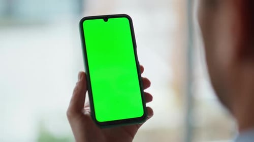 Adult Swiping a Green Screen Phone