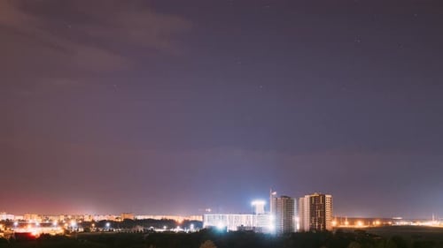 City Skyline at Night with Clouds Time Lapse