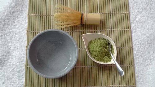 put in matcha powder into matcha bowl