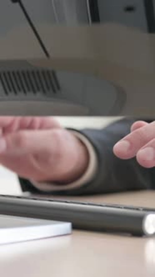 Close Up of Businessman Hands Typing on Keyboard, vertical video