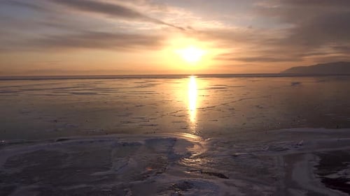 A view of the frozen Lake Bergère at dusk. The camera was shot horizontally.