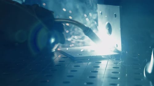 Skilled Welder Working on Metal Fabrication