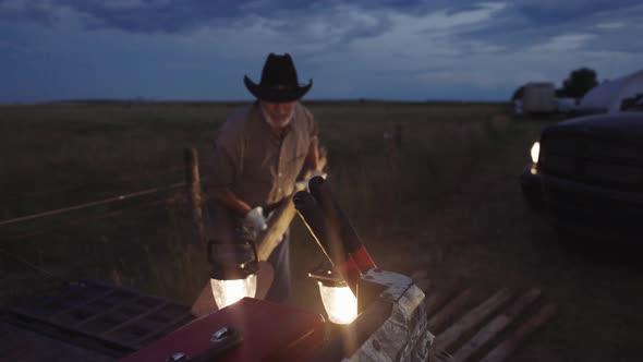 Fence Posts Onto Quadbe on Farm at Dusk Loading, People Stock Footage ...