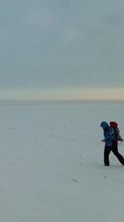 Lonely Human Walk Throw Snowy Desert
