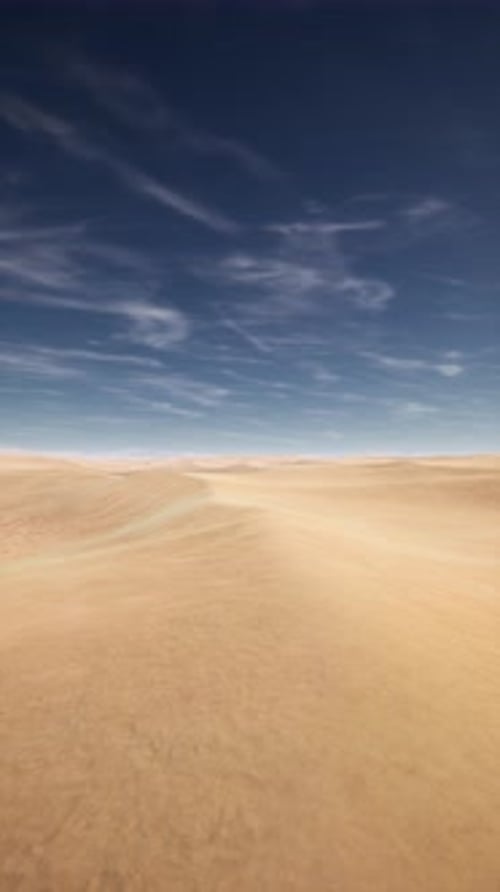 Desolate Desert Landscape Under Blue Sky and White Clouds