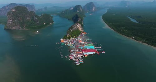 Secluded Floating Village At Ko Panyi In Phang Nga National Park, Thailand. Aerial Wide Shot