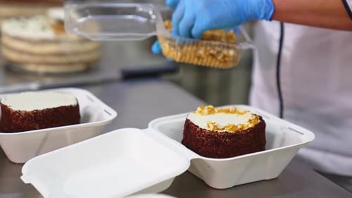 Confectioner Adds Candied Nuts to a Cake
