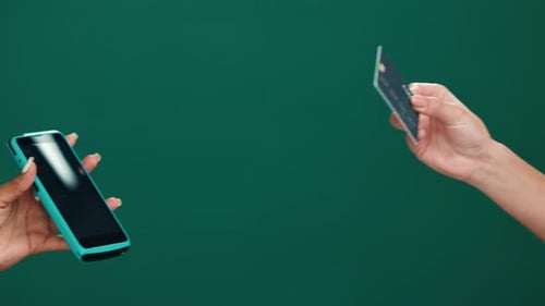 Machine, credit card and hands of people in studio for payment, transaction or POS with shopping