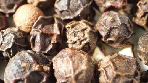 Macro Shot of Dry Black Peppercorns