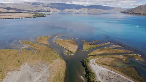 Aerial view of Ohau river delta where it meets Lake Benmore, Waitaki ...