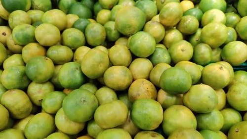 Pile Of Natural Organic Yellow And Green Lime Lemon