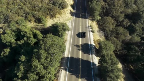 Aerial Above Footage of Car Driving on Beautiful Countryside Road California