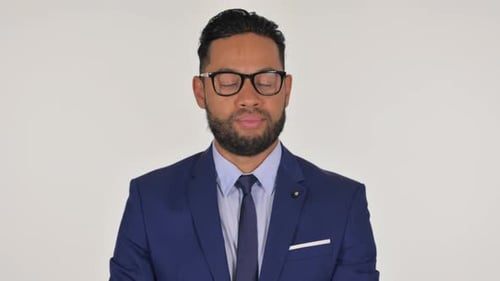 Man in Blue Suit Looking at Camera