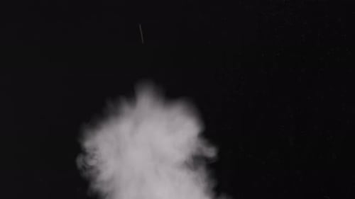 White Smoke or Vapor on Black Background