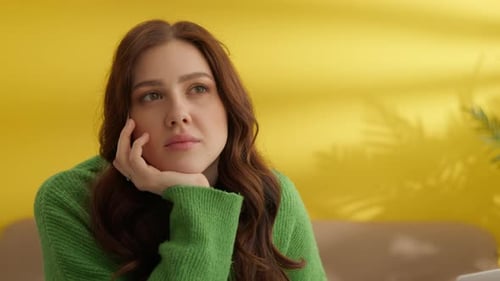 Woman Thinking, Resting Head on Hand Indoors