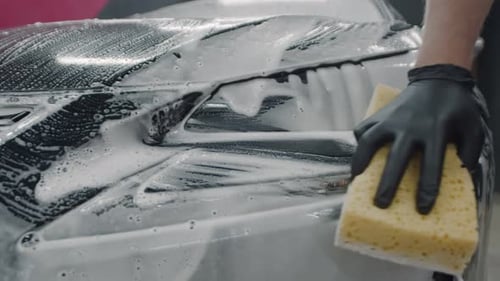 Cleaning Black Car on a Car Wash