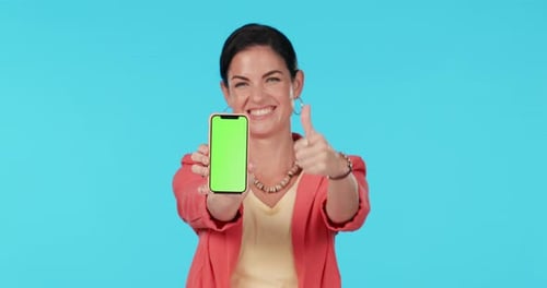 Green screen smartphone, okay thumbs up or happy woman with satisfaction feedback