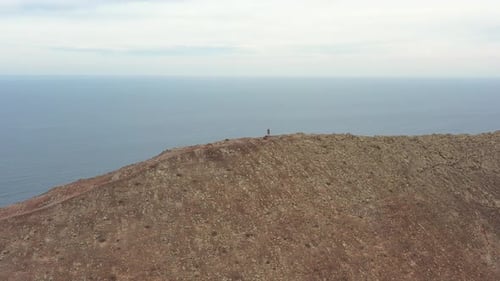 Couple on Mountain Ridge, Aerial Drone View of Red Mountain in Fuerteventura