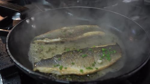 Fish Sizzling in a Pan