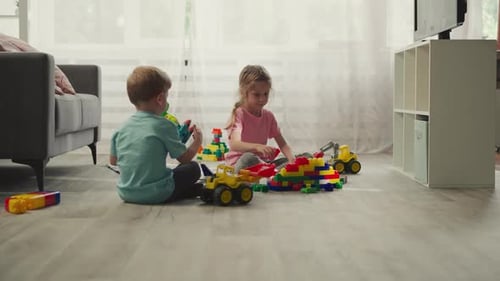 Children Playing with Toys in Living Room
