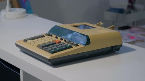Vintage Calculator on Desk