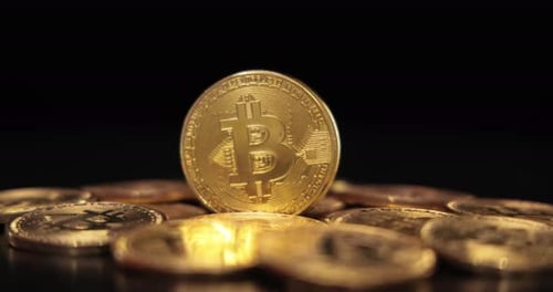 Rotating Bitcoin Cryptocurrency Tokens Close Up