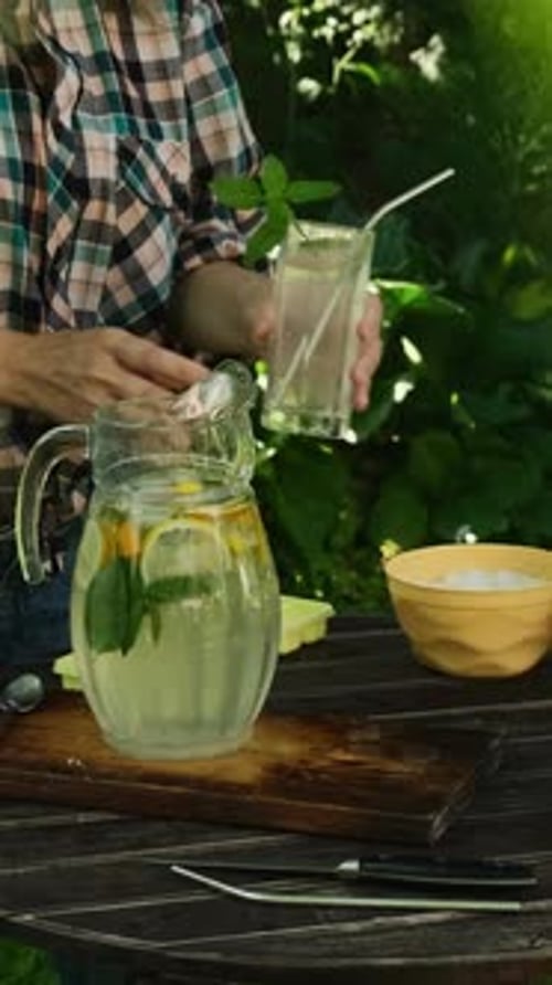 Refreshing Lemonade Placed on Table in Garden