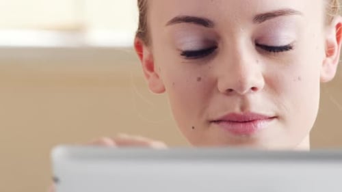 Close Up of Woman Using Tablet