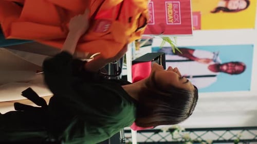 Vertical Video Black Friday Fight in Clothing Store