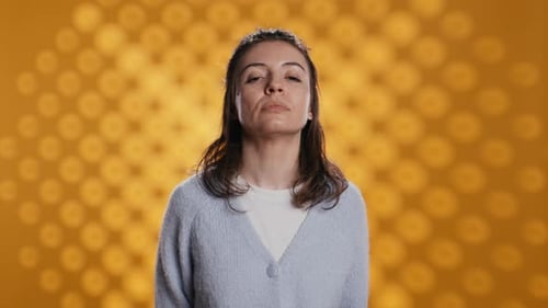 Person Dressed in Casual Attire Standing Isolated Over Studio Background