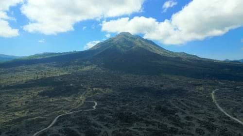 Aerial View of a Black Solidified Lava Flows Around an Active Volcano Mount Batur Bali Indonesia