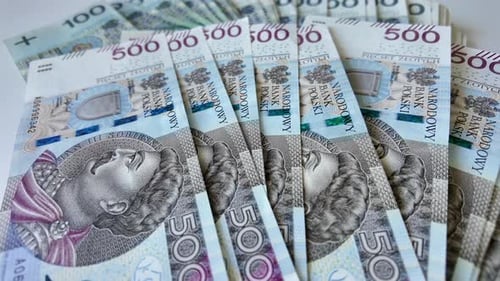 A huge amount of money in paper banknotes. Polish zlotys.