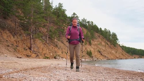 Hiking Tourism Adventure Hiker Girl Lady Tourist with Backpack Walking Near Lake Backpacker Hiker