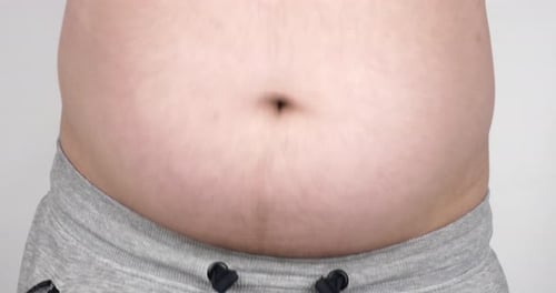 Bare Belly with Grey Sweatpants