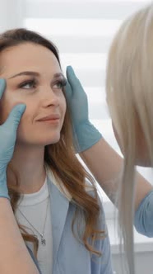 Woman Examined by Doctor in Medical Clinic