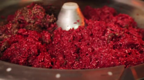 Machine with Minced Meat in Modern Sausage Making Workshop