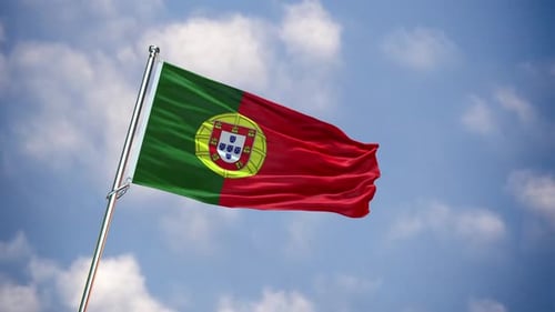 Realistic Portugal Flag Waving in Wind Against Blue Sky