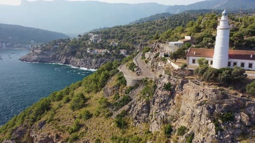 Aerial view of Far des Cap Gros, a lighthouse on the cliff, Mallorca, Spain.