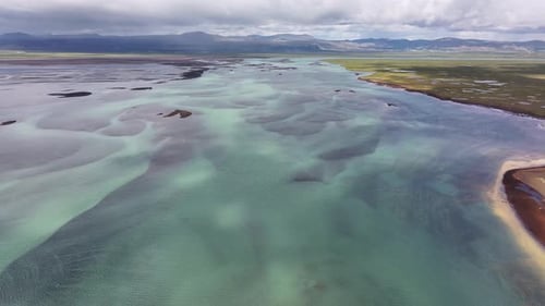 Braided waterway overlooking Olfusa River in Iceland on a cloudy summer day