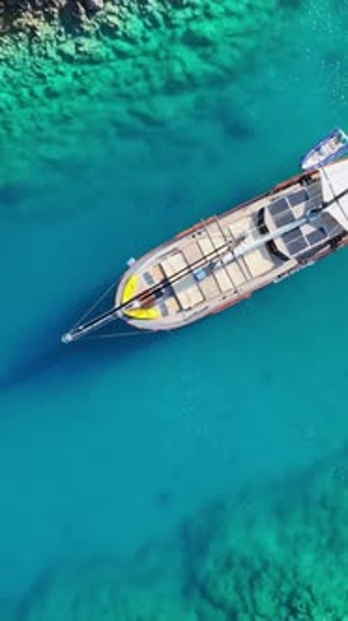 Aerial View of Boat Floating on Turquoise Water