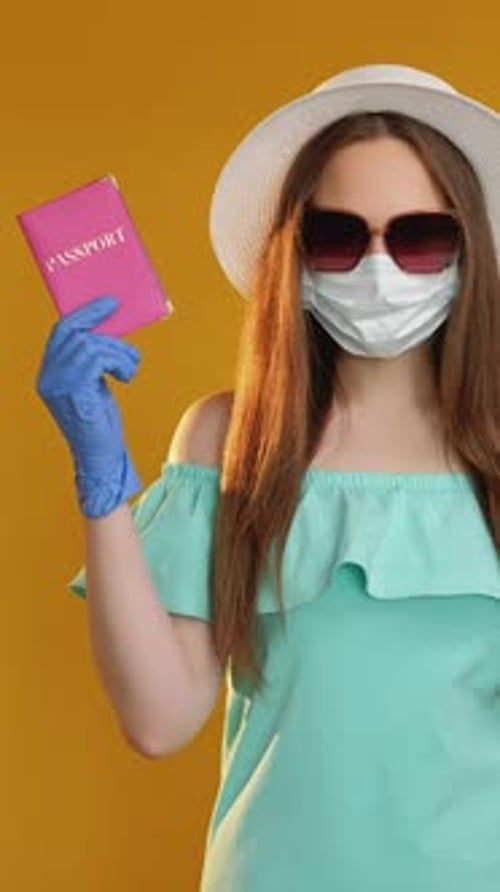 Woman Ready to Travel with Mask and Passport