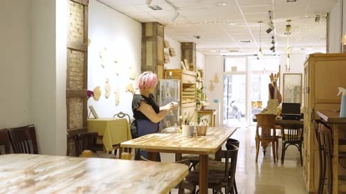 Woman Preparing Art Supplies in Cozy Workshop
