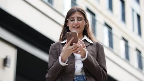Businesswoman Holding Chroma Key Phone at Camera Young Adult Female Showing Cellphone Green Screen