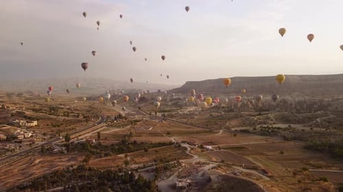 Hot air balloons flying over Goreme Historical National Park