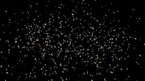 Abstract sparkling golden particles, confetti. Gold confetti particles scatter and fall. New Year