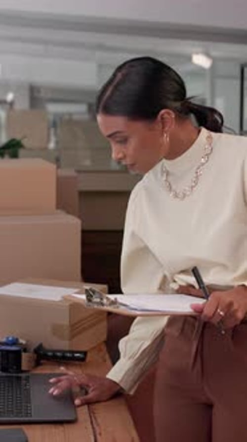Woman, clipboard and box with writing for logistics, planning and laptop for inventory at company