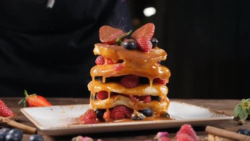 Delicious Pancake Stack with Berries and Caramel