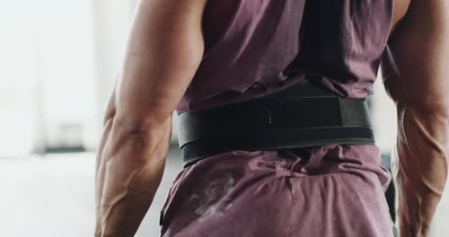 Muscular Man Weightlifting in Gym Close Up